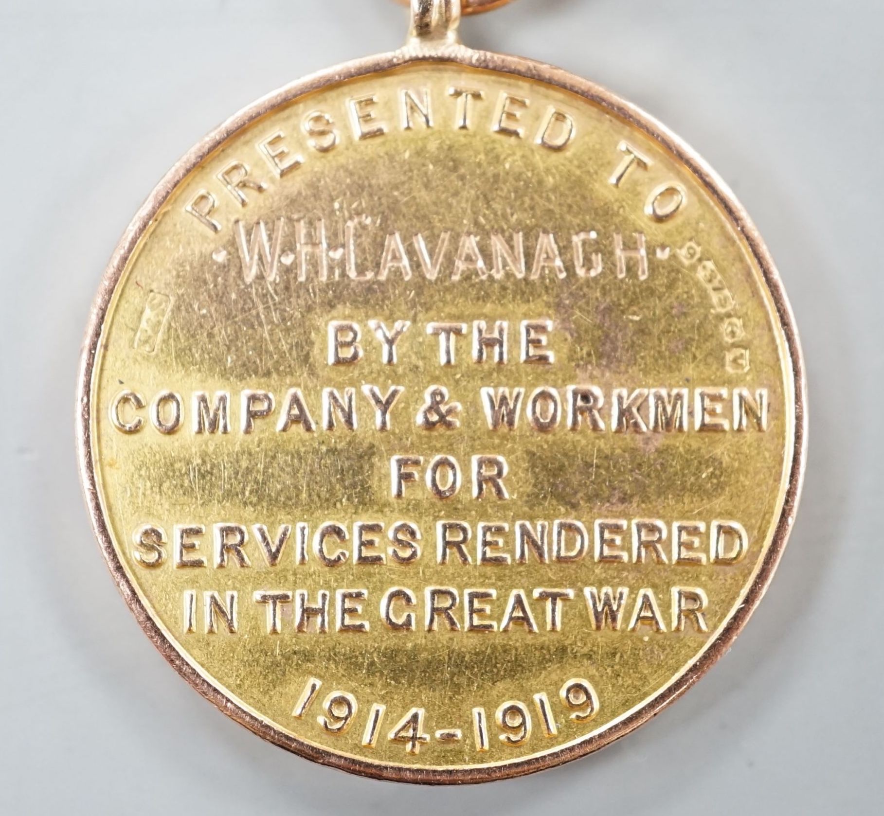 A WW1 related 9ct gold 'Manvers Main Collieries Welcome Home' medallion, presented to W.H. Cavanagh, 26mm